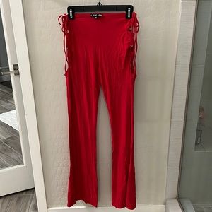 I AM GIA red pants.  Lace up on sides.